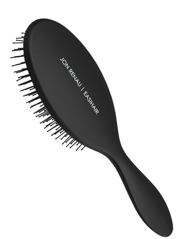 Paddle brush for wigs and toppers. Can be used on wet human hair and synthetic.